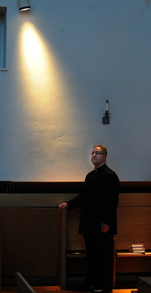 Deacon Martin Gallagher stands in the St John Vianney Chapel on the Christ the King Seminary campus as he prepares for his ordination at St. Joseph Cathedral on June 3. (Dan Cappellazzo/Staff Photographer)